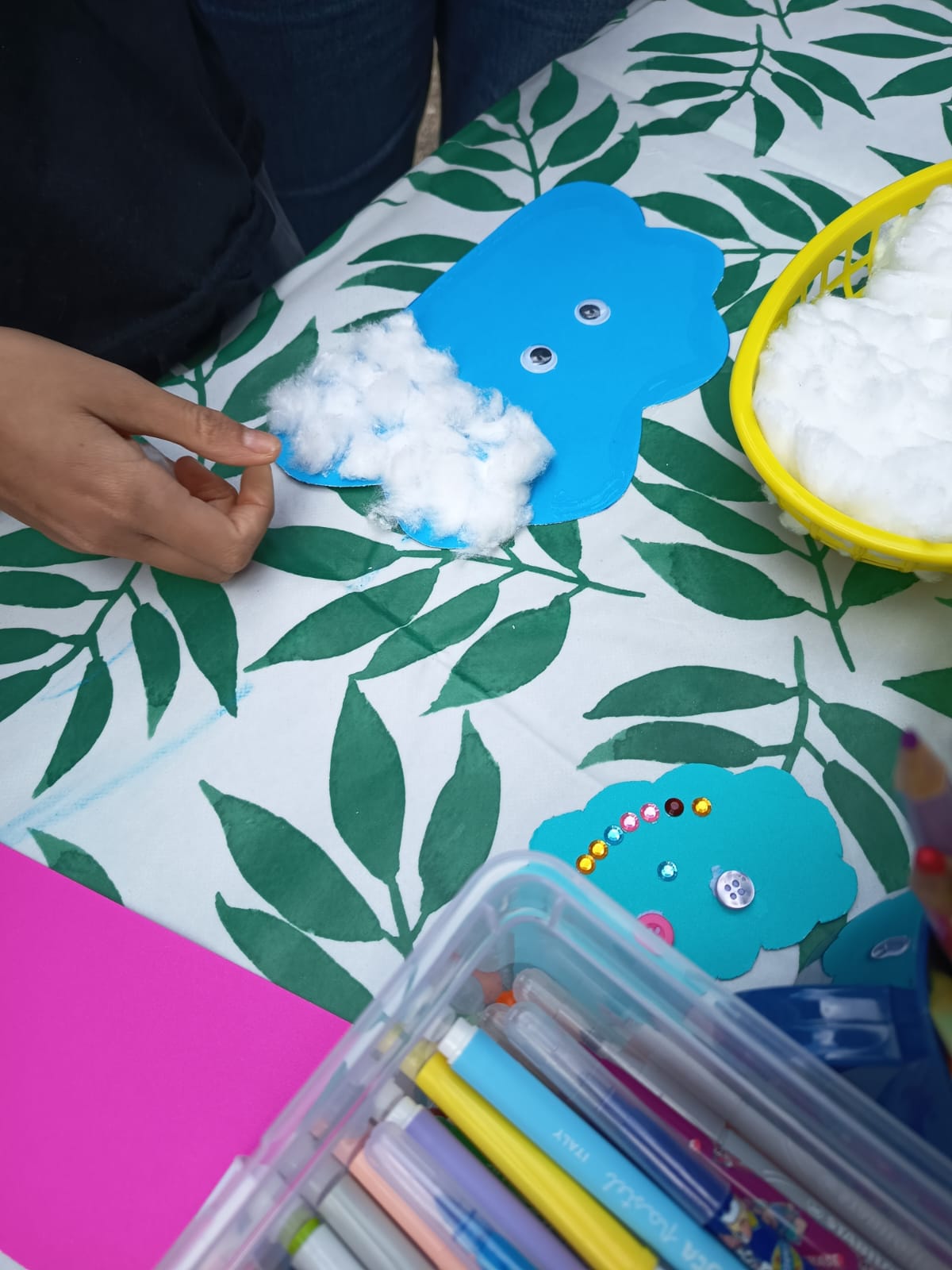 A close-up of a fluffy cotton-cloud craft at the Giggly Cloud book swap.