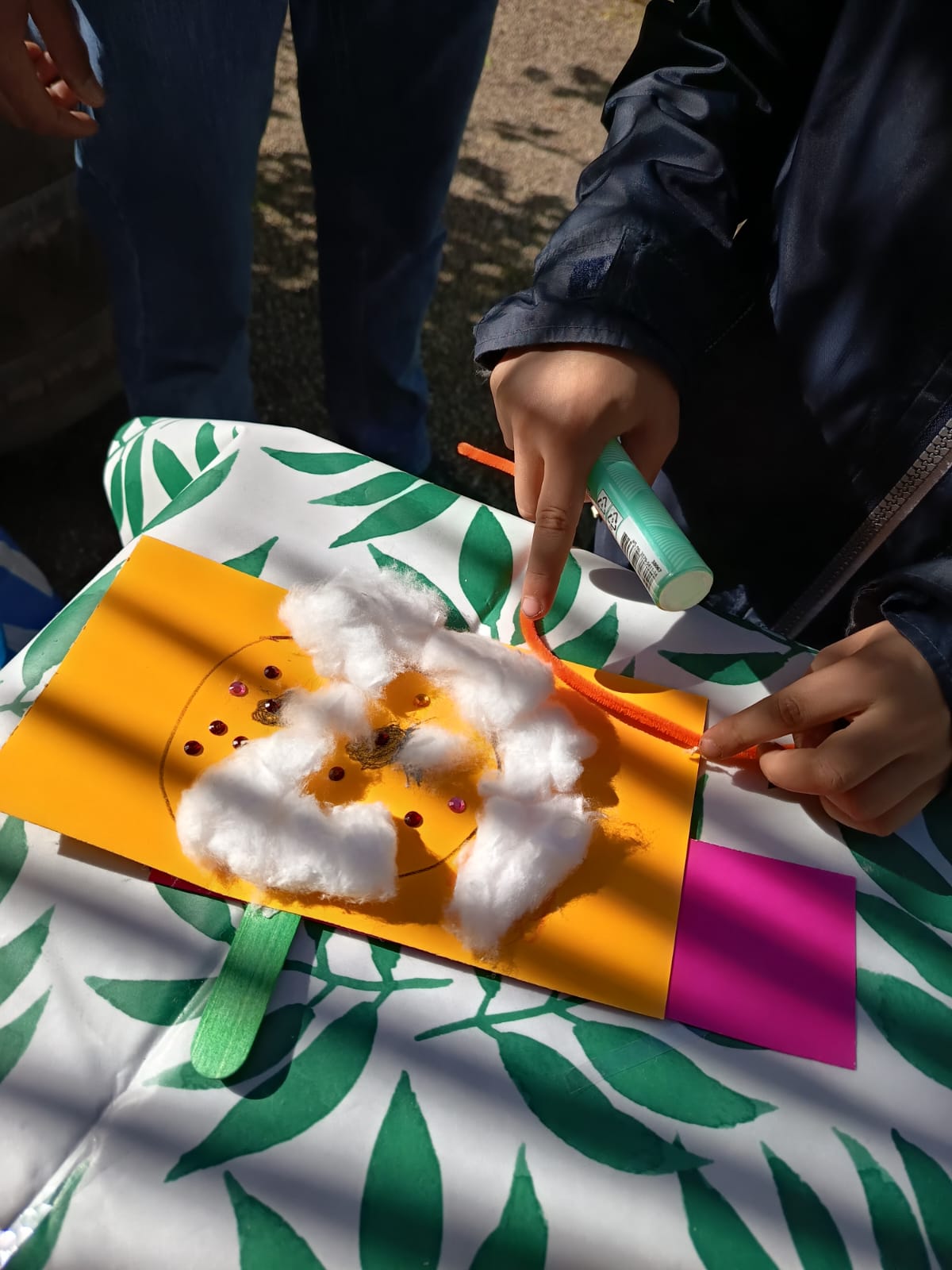 A cotton-cloud craft made by children at the Giggly Cloud book swap.